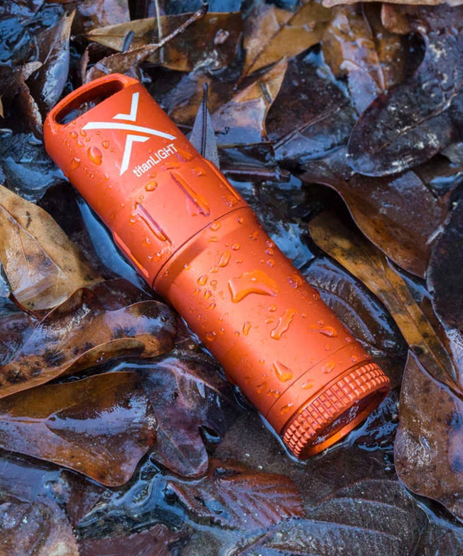EXOTAC accendino titanlight arancione impermeabile caduto in acqua