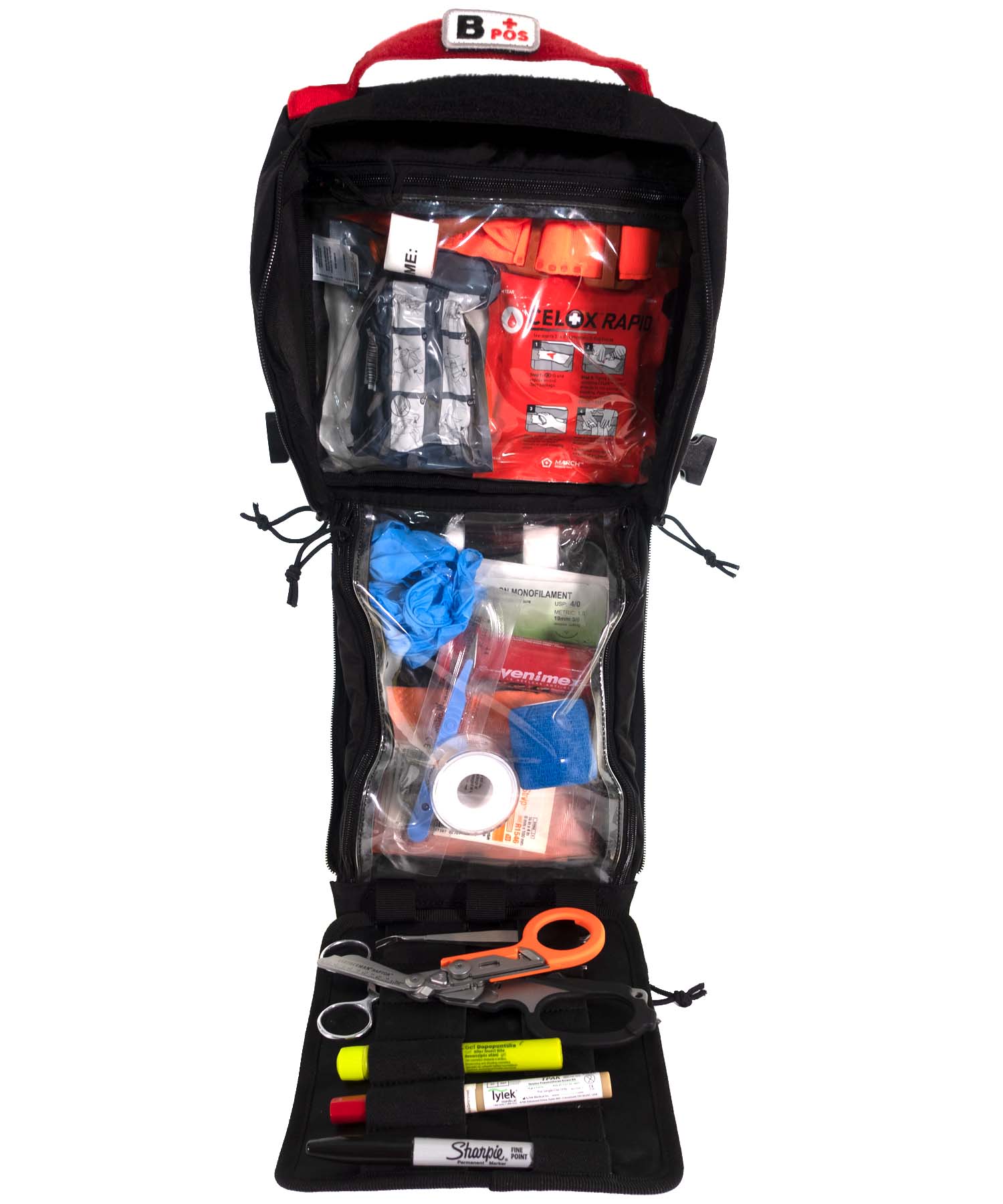 vista del med pouch gear set aperto completamente e organizzato con i presidi medici necessari in un'escursione