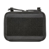 Flex Admin Pouch nera (black) di 5.11 - vista frontale con pannello molle tagliato al laser e velcro