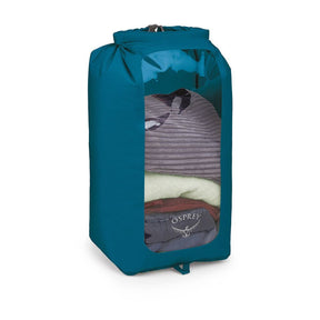 Sacca stagna ultraleggera Osprey Ultralight Dry Sack W/ Window in diverse capacità), con chiusura roll-top impermeabile e finestra trasparente per l'identificazione rapida del contenuto, disponibile nei colori blu petrolio (Waterfront Blue), arancione (Mars Orange) e nero