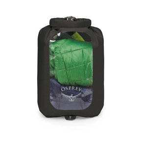 Sacca stagna ultraleggera Osprey Ultralight Dry Sack W/ Window in diverse capacità), con chiusura roll-top impermeabile e finestra trasparente per l'identificazione rapida del contenuto, disponibile nei colori blu petrolio (Waterfront Blue), arancione (Mars Orange) e nero