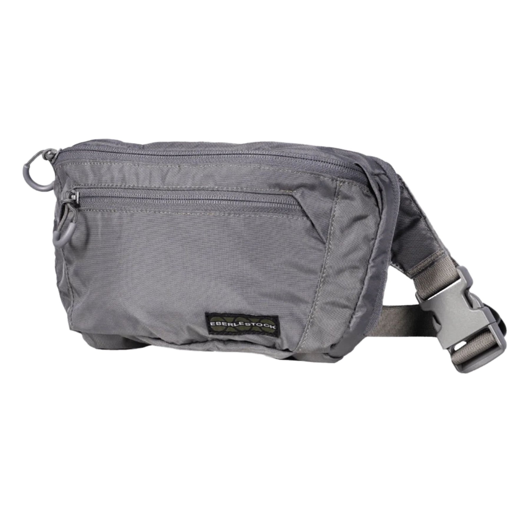 Eberlestock Bando Bag Marsupio tattico low-profile per EDC e porto occulto. Design discreto con tasca posteriore dedicata ad accesso rapido per arma e scomparto principale organizzato. Include passante per laccio emostatico. Soluzione versatile per sicurezza personale e urban carry. 2 misure.