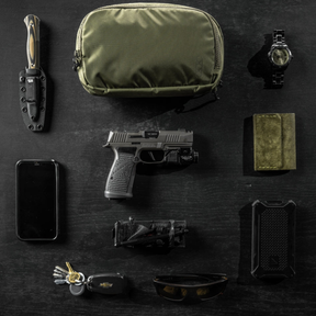 EBERLESTOCK FADE FLEX Marsupio tattico CCW. Versatile marsupio a tracolla per trasporto arma da fuoco con accesso rapido CCW e sistema interno foderato in loop per accessori. Realizzato in Nylon mini-Ripstop 210D, peso 312g e cintura regolabile fino a 55 pollici.