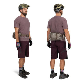 Osprey Seral 7 marsupio idrico da ciclismo e MTB con capacità 7 litri, serbatoio d'acqua integrato, tasche organizer con cerniera e cinghie di compressione stabilizzanti. Collezione 2026.
