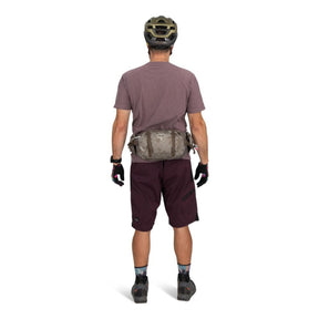 Osprey Seral 7 marsupio idrico da ciclismo e MTB con capacità 7 litri, serbatoio d'acqua integrato, tasche organizer con cerniera e cinghie di compressione stabilizzanti. Collezione 2026.