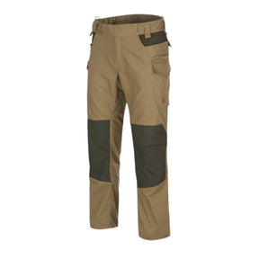 Helikon-Tex Pilgrim Pants pantaloni tecnici in tessuto DuraCanvas con rinforzi sulle ginocchia, tasche e vita rialzata per protezione renale. Ideali per bushcraft, escursionismo e attività outdoor impegnative.