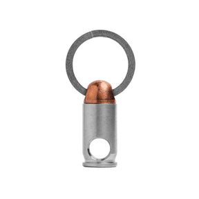 Exotac BMQR .380 Portachiavi a sgancio rapido magnetico con corpo in rame e acciaio inossidabile. Accessorio EDC compatto per organizzazione chiavi con attacco sicuro e design ispirato ai bossoli.