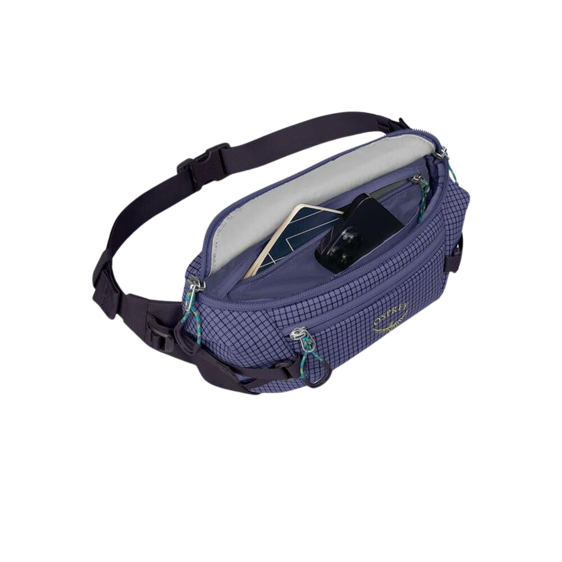 Osprey Transporter Waist Pack marsupio da 3 litri realizzato in tessuto tecnico con trama a griglia e logo frontale, dotato di tasca esterna con zip, cinghie di compressione laterali e cintura regolabile con fibbia a scatto per escursionismo e tempo libero.