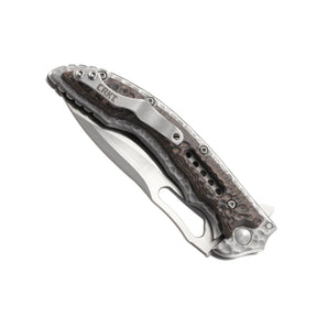 CRKT Fossil coltello chiudibile con apertura flipper su cuscinetti a sfera IKBS, lama drop point in acciaio 8Cr13MoV, guancette con lavorazione martellata e clip da tasca, robusto e versatile per uso EDC, campeggio e attività outdoor.