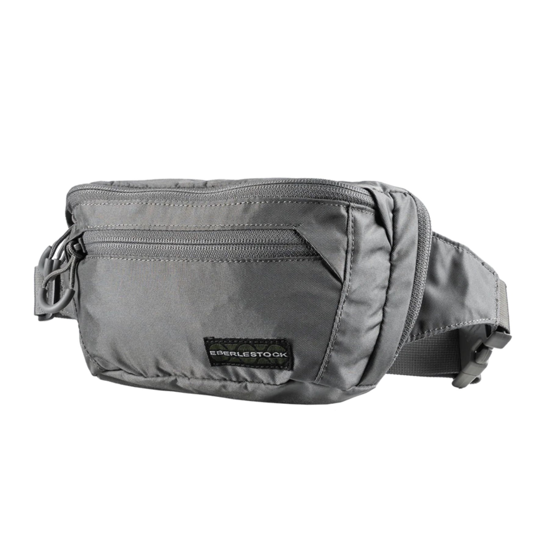 Eberlestock Bando Bag Marsupio tattico low-profile per EDC e porto occulto. Design discreto con tasca posteriore dedicata ad accesso rapido per arma e scomparto principale organizzato. Include passante per laccio emostatico. Soluzione versatile per sicurezza personale e urban carry. 2 misure.