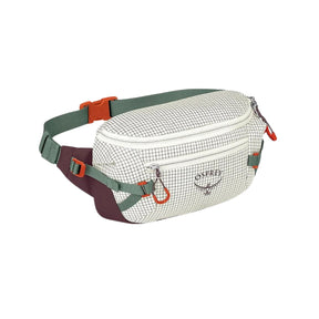 Osprey Transporter Waist Pack marsupio da 3 litri realizzato in tessuto tecnico con trama a griglia e logo frontale, dotato di tasca esterna con zip, cinghie di compressione laterali e cintura regolabile con fibbia a scatto per escursionismo e tempo libero.