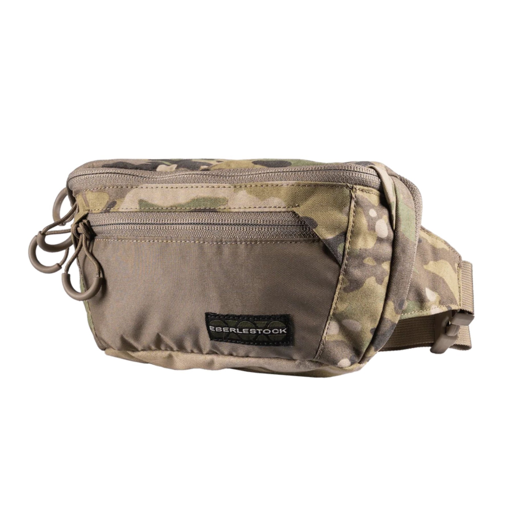 Eberlestock Bando Bag Marsupio tattico low-profile per EDC e porto occulto. Design discreto con tasca posteriore dedicata ad accesso rapido per arma e scomparto principale organizzato. Include passante per laccio emostatico. Soluzione versatile per sicurezza personale e urban carry. 2 misure.