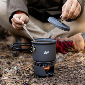 Esbit Camping Cookset fornello da campeggio a combustibile solido con pentolino, supporto frangivento e manici pieghevoli, ideale per trekking ultralight, bushcraft e kit emergenza.