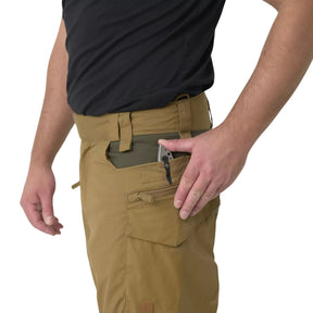 Helikon-Tex Pilgrim Pants pantaloni tecnici in tessuto DuraCanvas con rinforzi sulle ginocchia, tasche e vita rialzata per protezione renale. Ideali per bushcraft, escursionismo e attività outdoor impegnative.