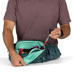Osprey Savu 5 cintura da ciclismo con capacità 5 litri e tasche per borracce a scomparsa. Marsupio ergonomico per mountain bike con schienale traspirante AirScape e ampi scomparti per attrezzi e snack, ideale per escursioni e trail.
