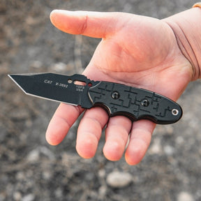 TOPS C.A.T. 203T-01 coltello a lama fissa tattico con profilo tanto, impugnatura ergonomica testurizzata e oro per cordino