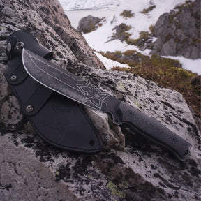 Fox Knives Native Bushcraft coltello a lama fissa full tang con profilo drop point scanalato e logo volpe inciso guancette sagomate con zigrinatura antiscivolo e foro per cordino per outdoor sopravvivenza ed escursionismo