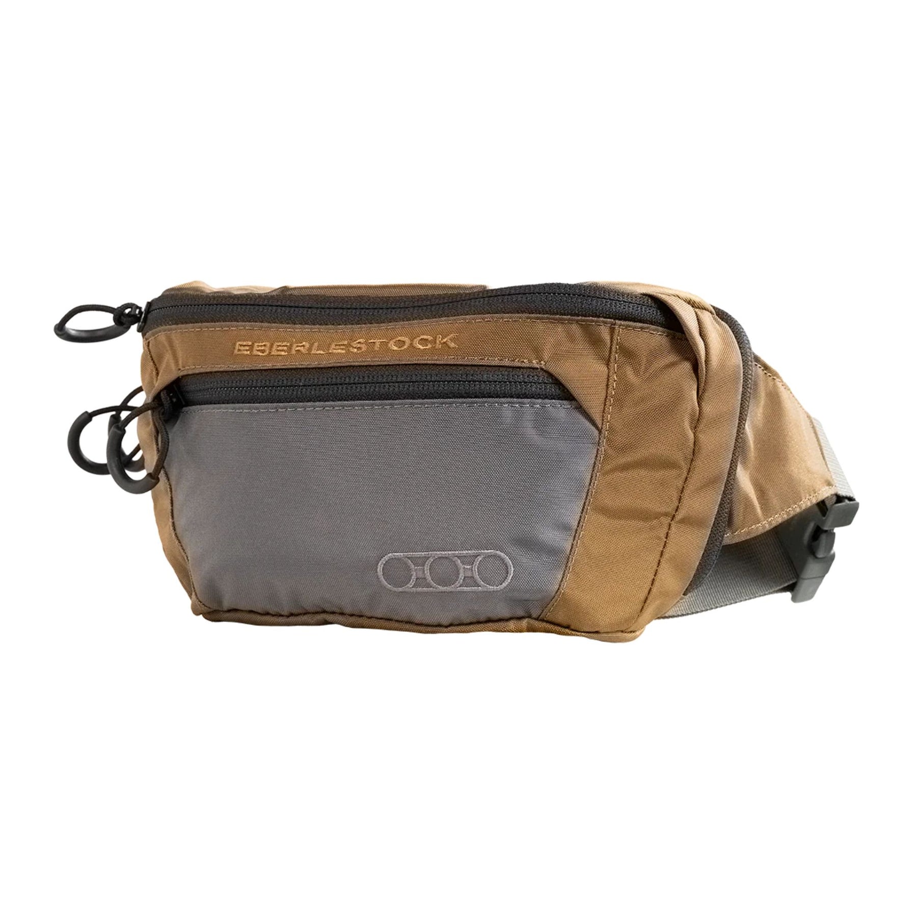 Eberlestock Bando Bag Marsupio tattico low-profile per EDC e porto occulto. Design discreto con tasca posteriore dedicata ad accesso rapido per arma e scomparto principale organizzato. Include passante per laccio emostatico. Soluzione versatile per sicurezza personale e urban carry. 2 misure.