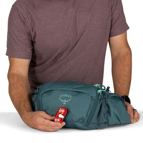 Osprey Savu 5 cintura da ciclismo con capacità 5 litri e tasche per borracce a scomparsa. Marsupio ergonomico per mountain bike con schienale traspirante AirScape e ampi scomparti per attrezzi e snack, ideale per escursioni e trail.