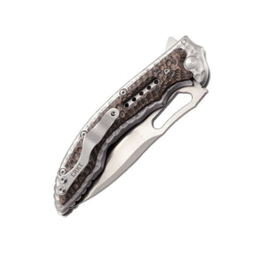 CRKT Fossil coltello chiudibile con apertura flipper su cuscinetti a sfera IKBS, lama drop point in acciaio 8Cr13MoV, guancette con lavorazione martellata e clip da tasca, robusto e versatile per uso EDC, campeggio e attività outdoor.