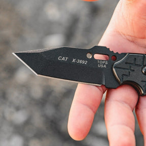 TOPS C.A.T. 203T-01 coltello a lama fissa tattico con profilo tanto, impugnatura ergonomica testurizzata e oro per cordino