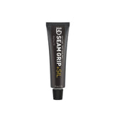 Gear Aid Seam Grip + SIL Silicone Sealant Sigillante per tende in silicone impermeabilizzante per cuciture e tessuti siliconati da 28 g o 42 in tubetto verticale per manutenzione attrezzatura outdoor su sfondo bianco.