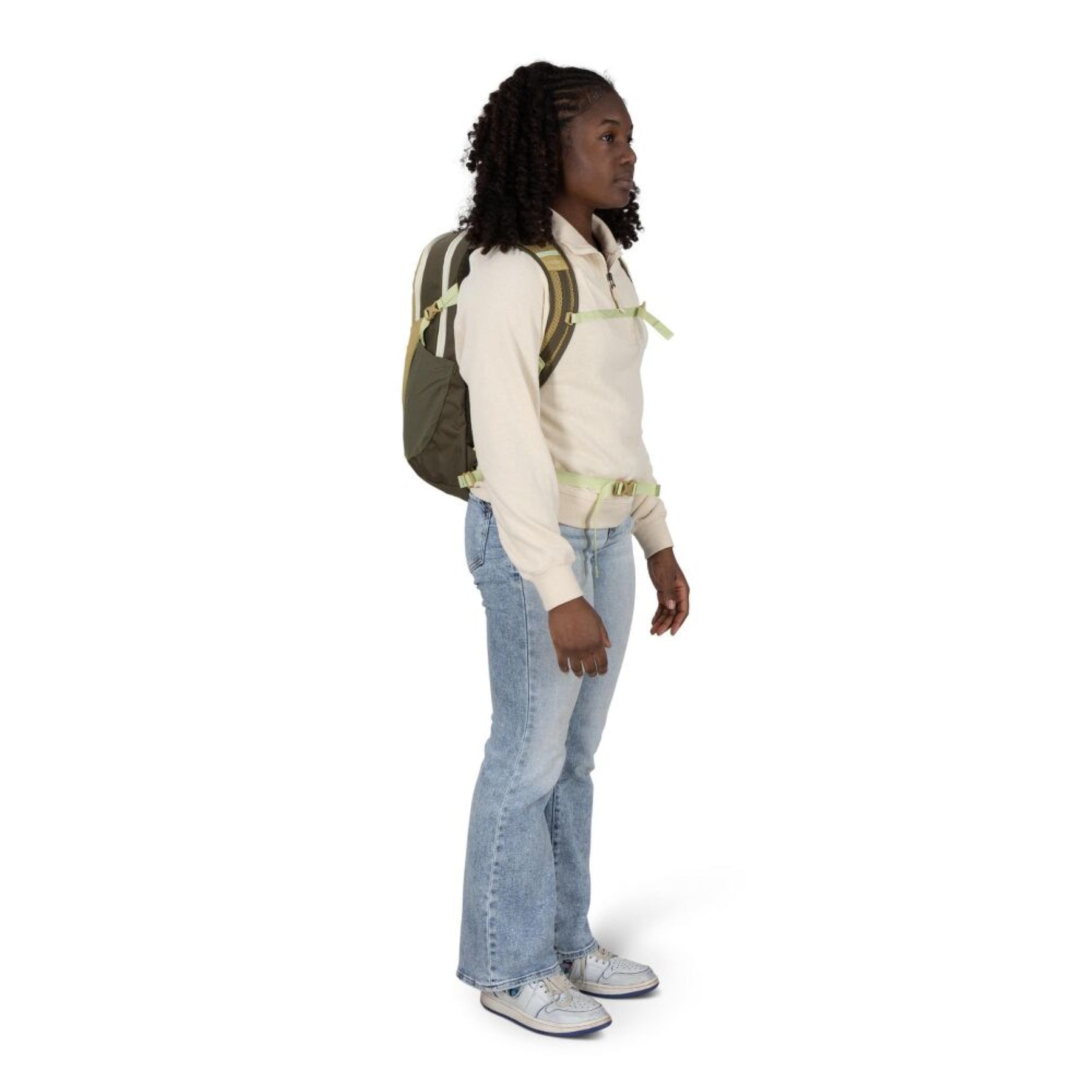 Osprey Daylite zaino compatto multiuso da 13 litri con spallacci in rete traspirante, scomparto principale con zip, tasche laterali in rete e cinghia sternale vista laterale per outdoor ed uso quotidiano su Backpacco