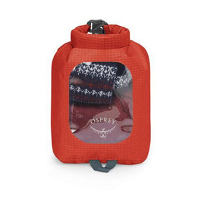 Sacca stagna ultraleggera Osprey Ultralight Dry Sack W/ Window in diverse capacità), con chiusura roll-top impermeabile e finestra trasparente per l'identificazione rapida del contenuto, disponibile nei colori blu petrolio (Waterfront Blue), arancione (Mars Orange) e nero