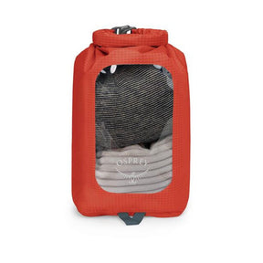 Sacca stagna ultraleggera Osprey Ultralight Dry Sack W/ Window in diverse capacità), con chiusura roll-top impermeabile e finestra trasparente per l'identificazione rapida del contenuto, disponibile nei colori blu petrolio (Waterfront Blue), arancione (Mars Orange) e nero