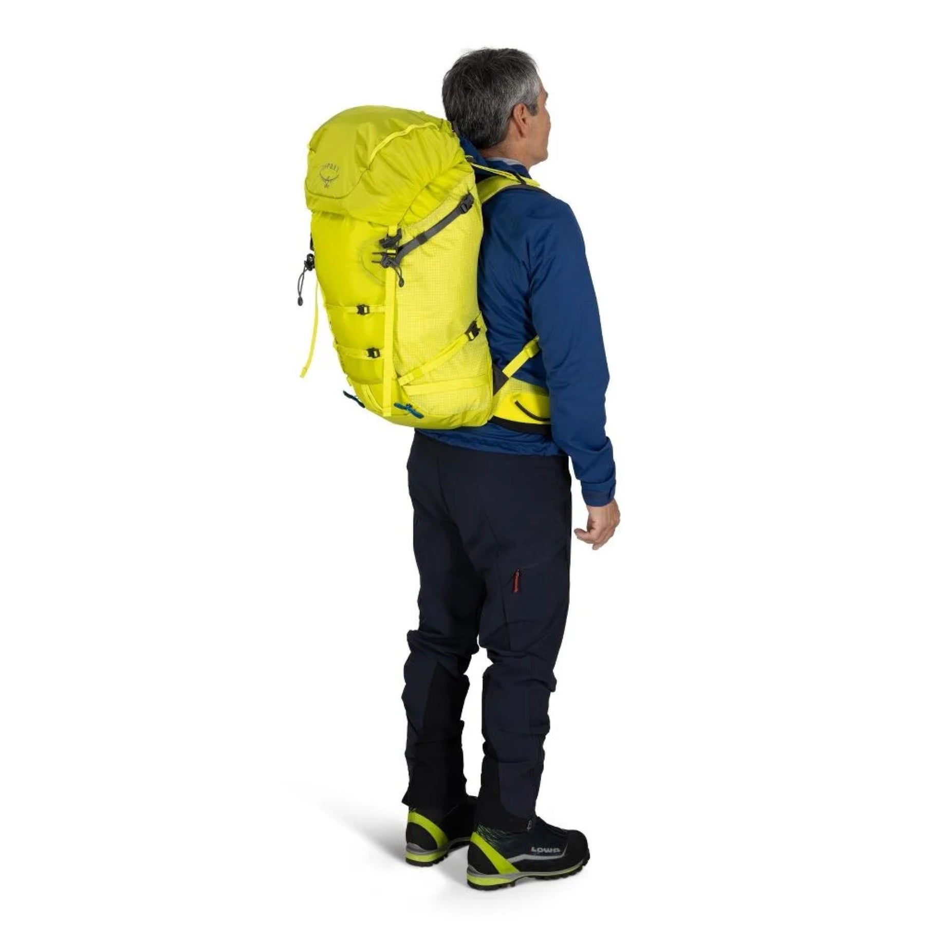 Osprey Mutant 38: Zaino da alpinismo tecnico da 38 litri. Caratterizzato dal sistema Dual ToolLock per piccozze, pannello posteriore antineve e fibbie progettate per l'uso con i guanti. Struttura leggera e snodata ottimizzata per scalate su ghiaccio e roccia, con compressione laterale e punti di aggancio per attrezzatura.