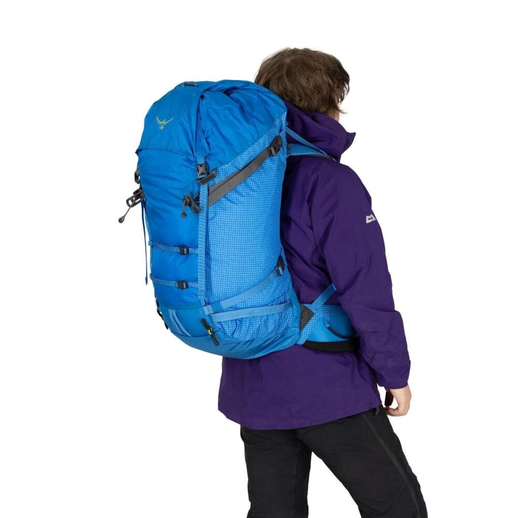 Osprey Mutant 52: Zaino da alpinismo e spedizione da 52 litri. Progettato per l'uso tecnico su ghiaccio e roccia con sistema di trasporto piccozze Dual ToolLock, pannello posteriore antineve e fibbie adatte all'uso con guanti. Struttura leggera e resistente per ascese alpine impegnative in ogni stagione.