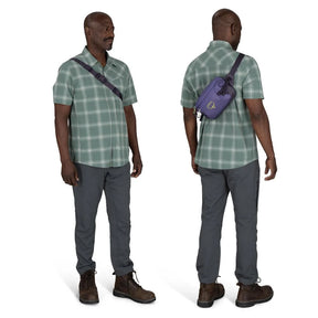 Osprey Transporter Waist Pack marsupio da 3 litri realizzato in tessuto tecnico con trama a griglia e logo frontale, dotato di tasca esterna con zip, cinghie di compressione laterali e cintura regolabile con fibbia a scatto per escursionismo e tempo libero.