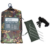 DD Tarp 3x3 multicam nel suo sacchetto con i picchetti e i cordini